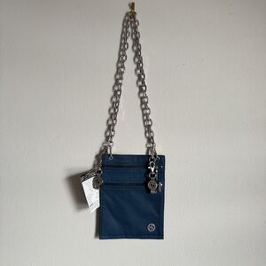 The Hip Klip Black Synthetic Travel Pouch Phone Bag cross body small purse Wine